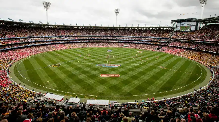 Aerial view of the MCG during a sold out AFL game.