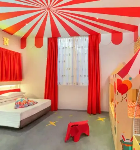Circus-themed Dorsett Tsuen Wan hotel room.