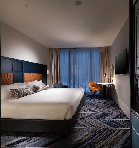 Window view king-size bed at Dorsett Room, Melbourne