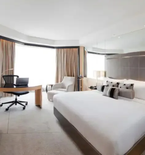 Work-desk by the bed in the Club Room at Dorsett Grand Subang.