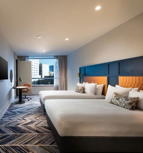 Daytime view king beds in Dorsett Melbourne Discovery Room