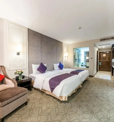 Interior of Dorsett Superior Room with en suite bathroom.