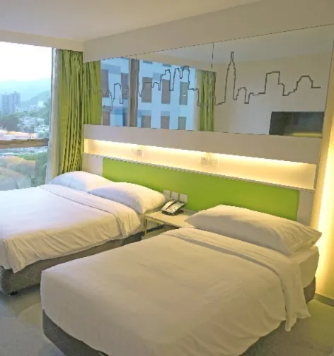 Double and a single bed in the Family Triple Room, Dorsett Tsuen Wan.