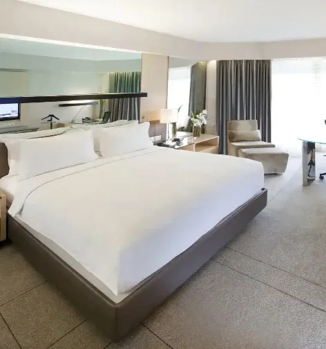 King bed in the Deluxe Room at Dorsett Grand Subang.