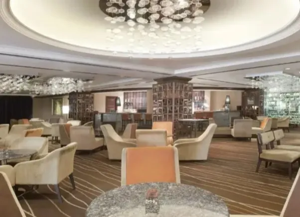 Chandelier light and seatings in the Piano Lounge.